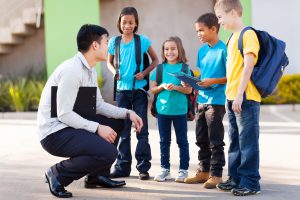 Teacher with students